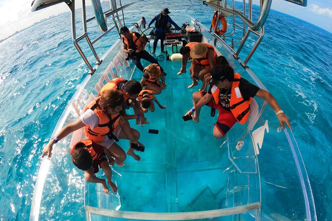 90 Minute Clear Boat Tour in Cancun - The Caribbean Sea and the coral reef visit