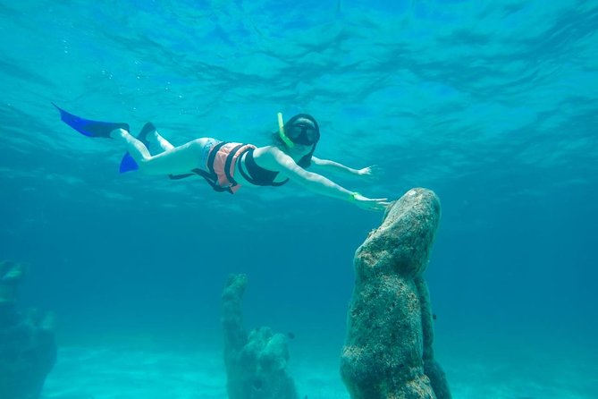 Afternoon Half-Day Catmaran Sailing and Snorkel Adventure - The snorkeling stop near Isla Mujeres