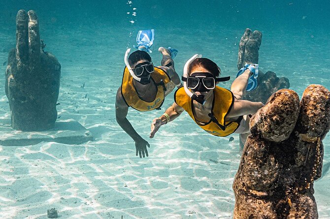 All-Inclusive Isla Mujeres Catamaran with Free Transportation - Free time in downtown Isla Mujeres