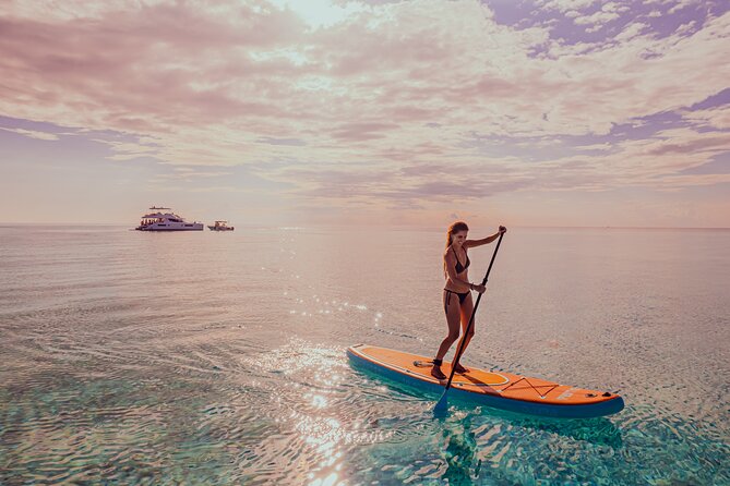 All Inclusive Luxury Yacht – Private Island Experience - Using the paddle boards, inflatables, and snorkel gear