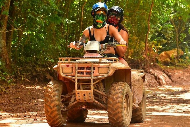 Amazing ATV with Zip Lines and Swim in Cenote with Round Transportation - ATV riding on uneven jungle terrain