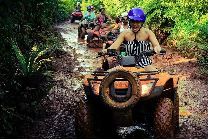 Amazing ATV with Zip Lines and Swim in Cenote with Round Transportation - Cooling off in a natural freshwater cenote