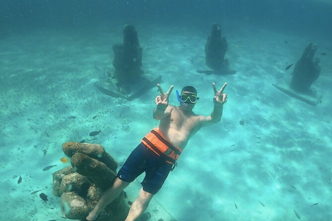 Amazing Catamaran to Isla Mujeres for the best price - Snorkeling near Isla Mujeres with a certified guide