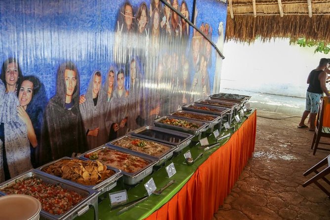 Amazing tour to the beauty Isla Mujeres with Snorkel and open bar - Visiting downtown Isla Mujeres