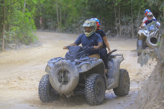 ATV adventure, Ziplines, Cenote Swim, Snack & Transport Included. - Ziplining with patient instruction