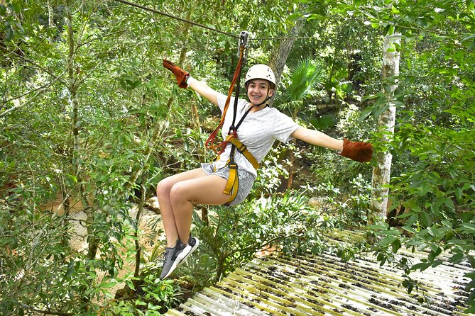 ATV Jungle Adventure with Ziplines, Cenote & Transportation - Three ziplines above the jungle