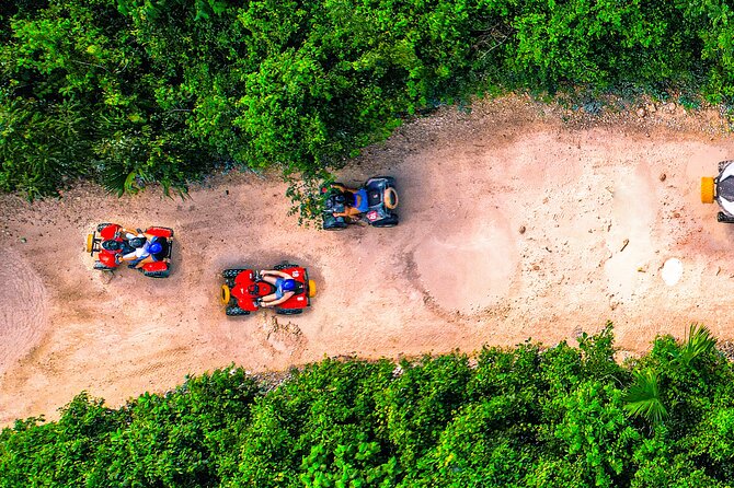 ATV Jungle Adventure with Ziplines, Cenote & Transportation - Cooling off at Cenote Verde Lucero