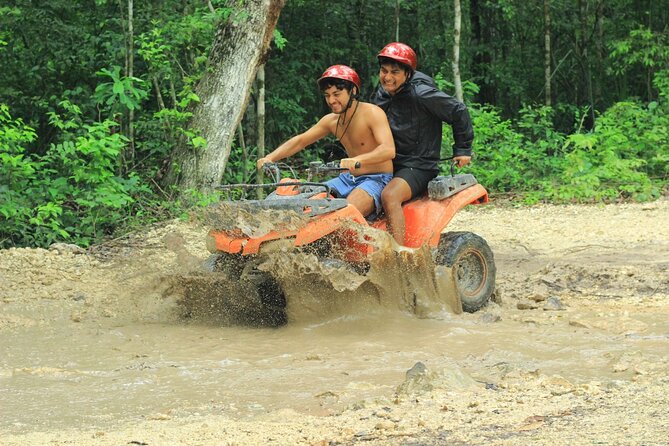 ATV Tour from Cancun and Puerto Morelos with Ziplines and Cenote. - ATV riding through the jungle park