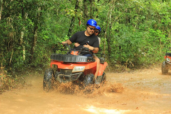 ATV Tour from Cancun with Zipline and Cenote Swim - ATV riding on jungle trails