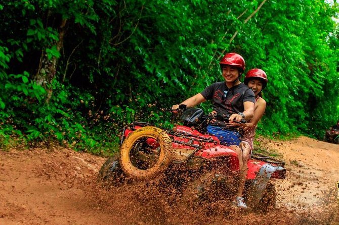 ATV Tour with Cenote swim, Ziplines, Transportation and Lunch Included - Ziplines through the trees