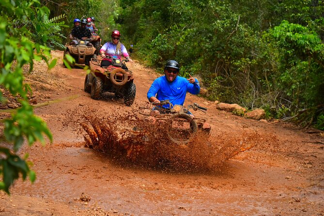 Awesome ATV experience in the jungle with cenote swim and ziplines included - ATV riding on the jungle obstacle course
