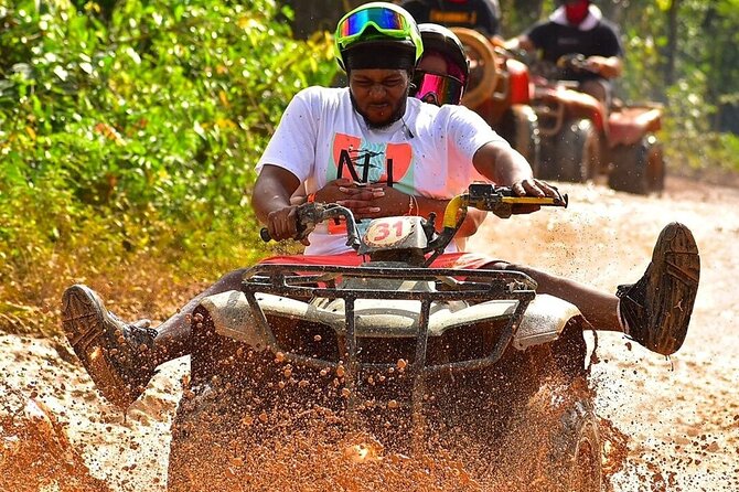 Best Adrenaline Rush in Cancun: ATV, Zip Lines, Cenote, Lunch! - Cooling off in a freshwater cenote