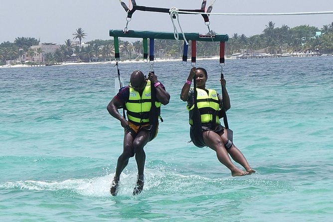 Cancun Adventure: Reef Snorkeling & Parasailing Experience - Parasailing above the Caribbean