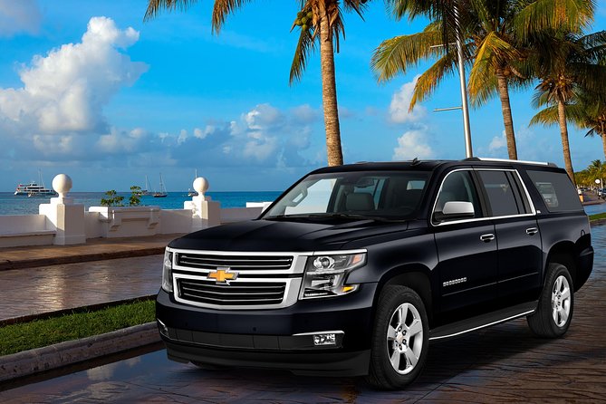 Cancun Airport to Hotel Private Deluxe SUV - Meeting your driver after baggage claim