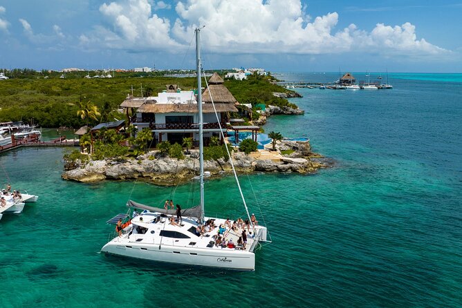 Cancun Catamaran: Sail to Isla Mujeres + Buffet & Drinks - Setting sail from Playa Tortugas at noon