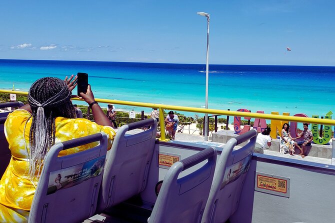 Cancun City Tour by Downtown and Turistic Hightlights on Open Bus - Playa Delfines and the Cancun sign