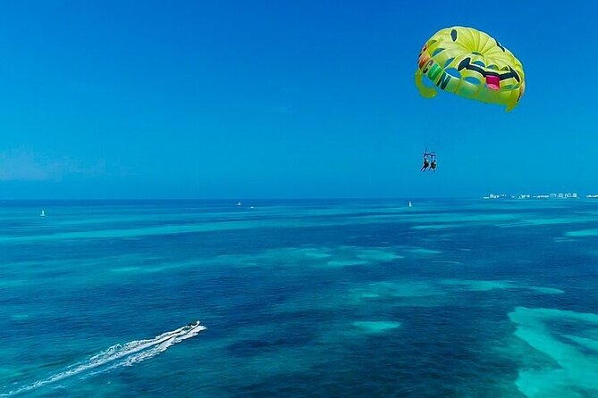 Cancun Combo Adventure: 4 Reef Snorkeling Stops & Parasailing - Weather, cancellation, and choosing the right day