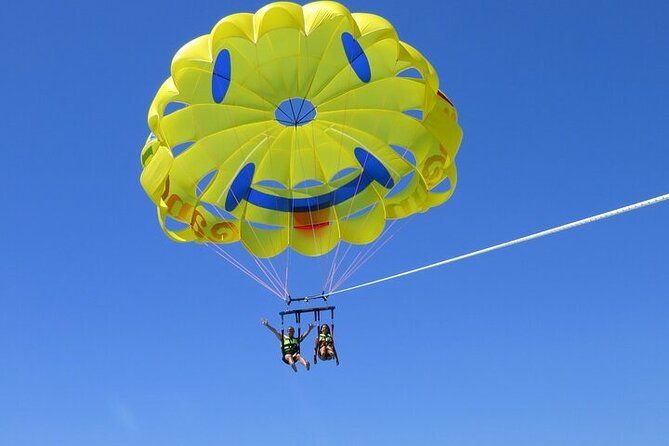Cancun Combo Adventure: 4 Reef Snorkeling Stops & Parasailing - Guides, safety, and the practical side of open-water snorkeling