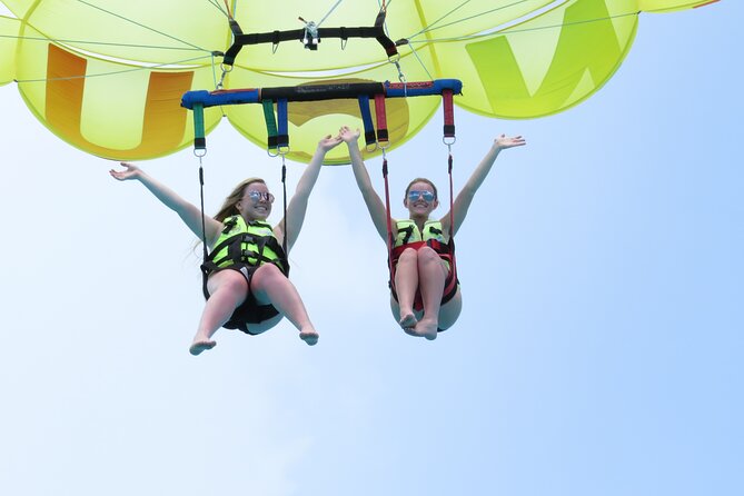 Cancun Combo Adventure: 4-Reef Stop Snorkeling and Parasail Ride - Pickup, marina timing, and the $20 cash fee
