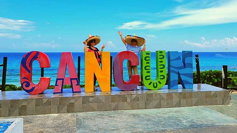 Cancun: Guided City Tour with Shopping by Double Decker Bus - Guides, language, and the feel of the day