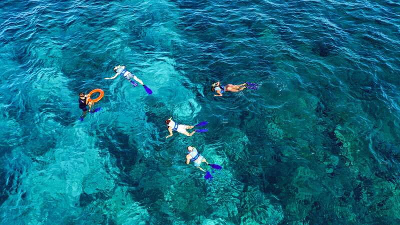 Cancun: Isla Mujeres Catamaran Tour with Open Bar of Drinks - Playa Norte and the beach club
