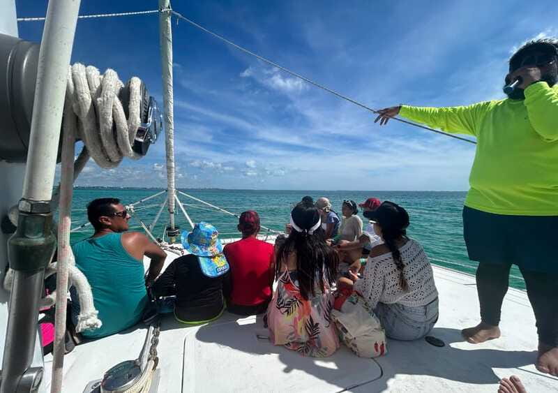 Cancun: Isla Mujeres Catamaran with buffet, drinks & snorkel - The open bar and onboard mood