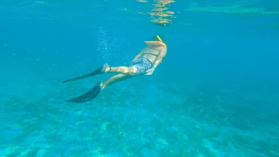 Cancun: Isla Mujeres Full Day Dancer Cruise - A seven-hour day that starts before the boat moves