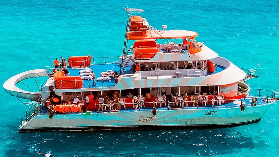 Cancun: Isla Mujeres Full Day Dancer Cruise - The return trip becomes a floating dance floor