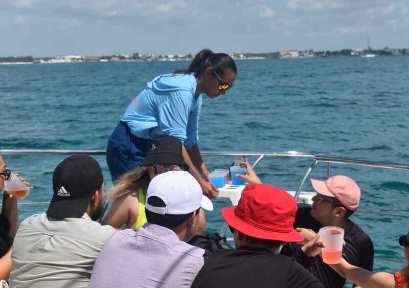 Cancun: Isla Mujeres Only Adults Catamaran, drinks & snorkel - Sailing south with a drink in hand