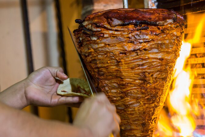 Cancun Local Experience: Taco and Beer Food Tour - Stop four: The legendary taco al pastor