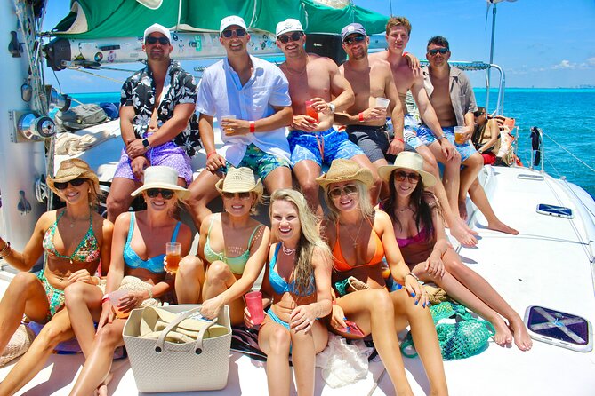 Cancun: Private Catamaran with Open Bar & Snorkeling Option - Sailing to Isla Mujeres on the seven-hour trip