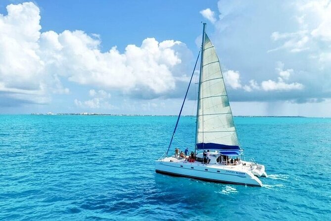 Cancun's Best: Catamaran to Isla Mujeres, Snorkeling & Drinks! - Snorkeling in changing Caribbean conditions