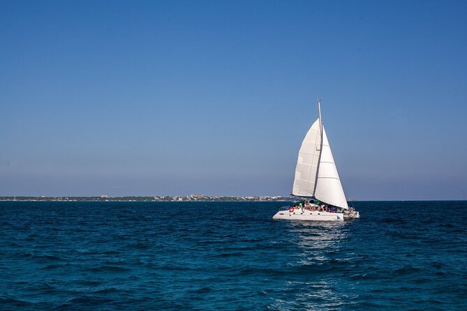 Cancun Sailing Catamaran Islas Mujeres With Luxury Beach Club - Setting sail from Playa Tortugas