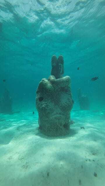 Cancun: Snorkeling Boat Tour with Gear - Sea cenotes beneath the boat route