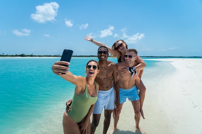 Cancun: Speedboat tour to a Virgin Beach - Taking the controls at Punta Cocos