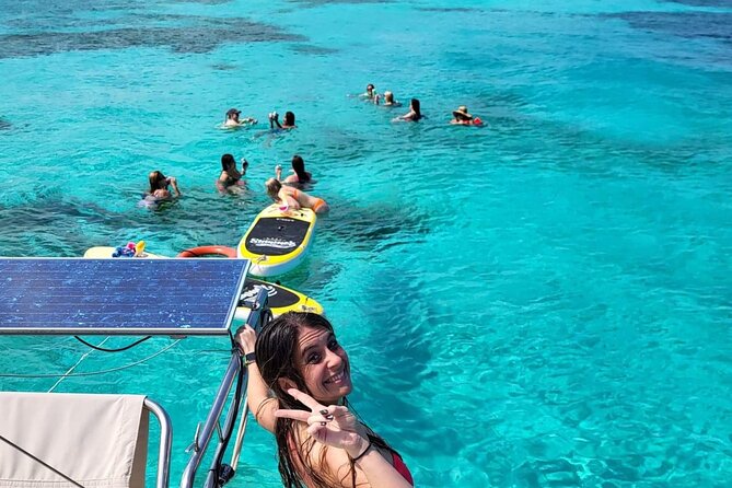 Cancun to Isla Mujeres Private Catamaran Cruising Snorkeling Fun! - Sailing toward Isla Mujeres with an open bar
