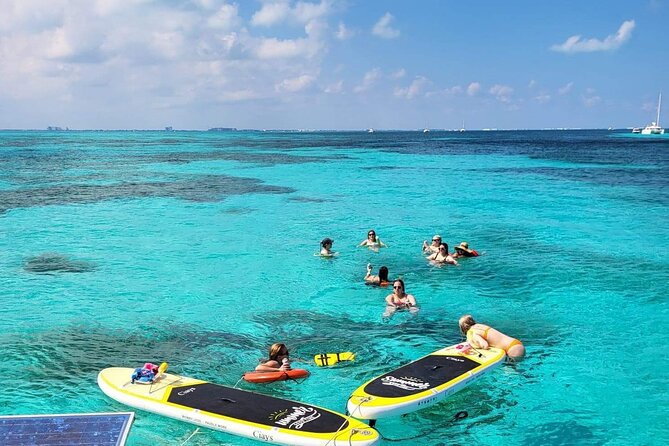 Cancun to Isla Mujeres Private Catamaran Cruising Snorkeling Fun! - Playa Norte, rooftop lunch, and a little island freedom