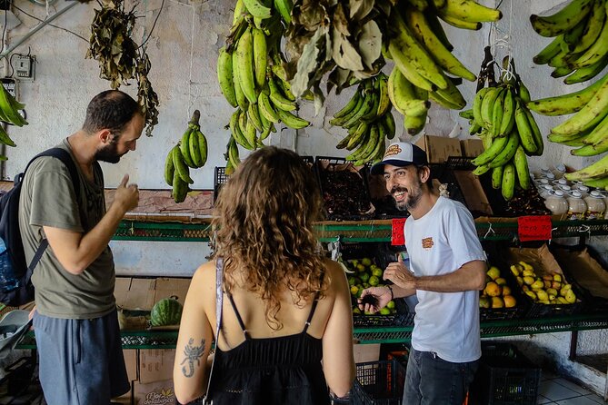 Cancun Walking Food Tour: Local Food, Markets, and Street Art. - Fresh fruit and natural drinks at a local shop