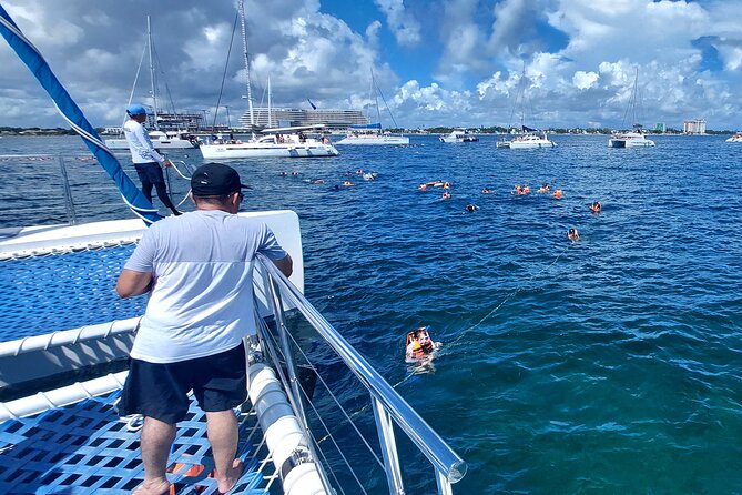 Catamaran Adventure Isla Mujeres with Snorkeling and Beach Club - Food, drinks, and service: what to watch closely