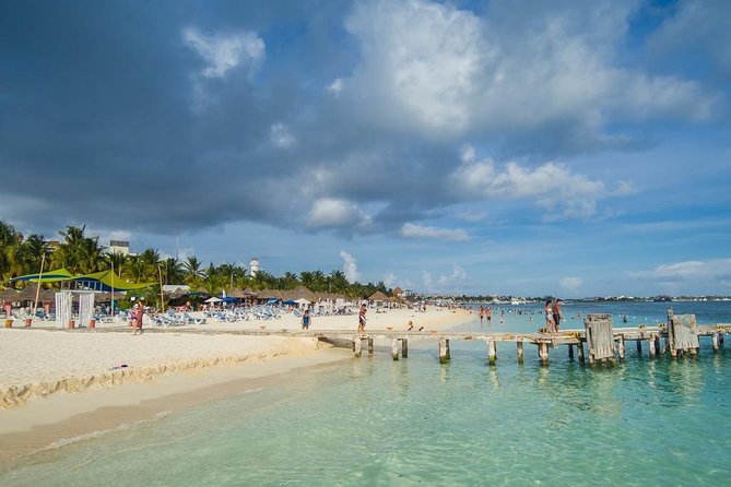 Catamaran adventure to Isla Mujeres with Snorkel,Buffet,Open Bar and Beach Club - The $55 price and the extra dock fee
