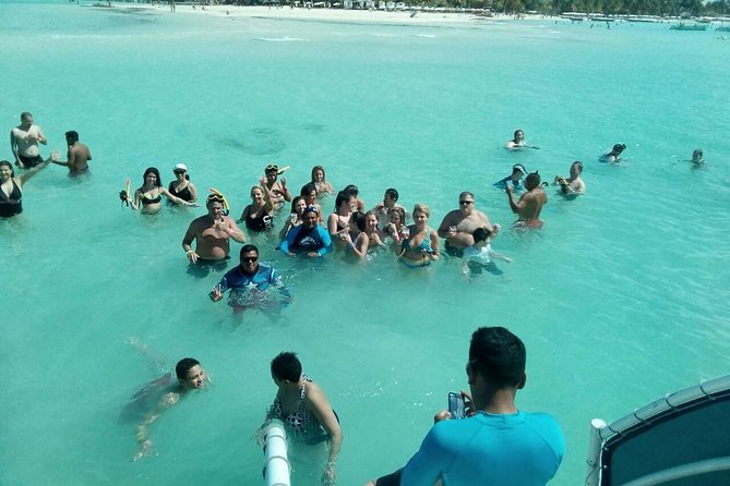Catamaran Adventure Tour Isla Mujeres Unlimited from Cancun with Transportation - Sunset views on the return sail