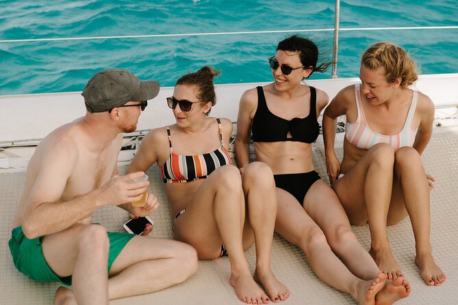 Catamaran Cancun to Isla mujeres Lunch OpenBar and Snorkeling - Catamaran music, drinks, and the social mood