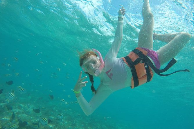 Catamaran Group Sightseeing, Snorkeling Tour Isla Mujeres - Lunch, open bar, and the party atmosphere