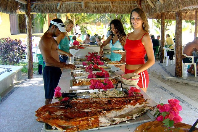 Catamaran Sailing to Isla Mujeres with Snorkeling, Lunch & Open Bar included - Isla Mujeres beach club and buffet lunch