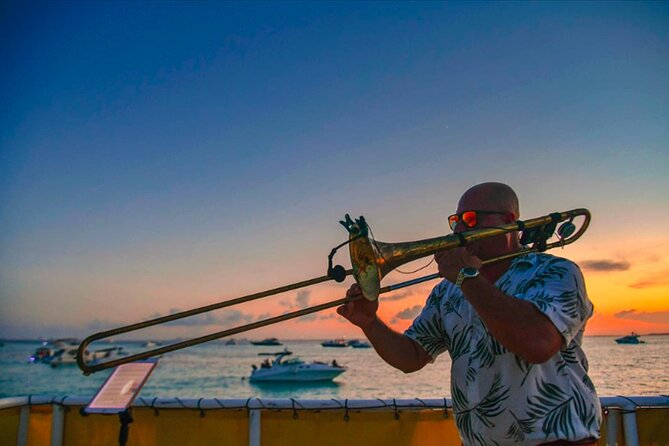 Catamaran Sunset Cruise to Isla Mujeres from Cancun - A sunset cruise with a party-boat heartbeat