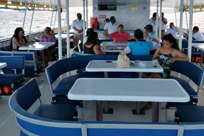 Catamaran to Isla Mujeres at sunset pick up Cancun - What the drinks and entertainment mean