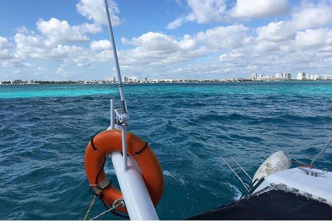 Catamaran to Isla Mujeres, Open bar, buffet, Beach Club Included - Arriving at Isla Mujeres from north to west