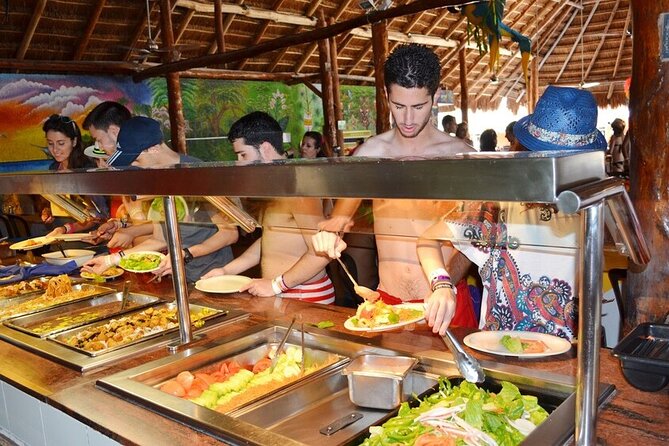 Catamaran Tour to Isla Mujeres from Cancún with Bar and Lunch - Beach-club time and the Mexican buffet