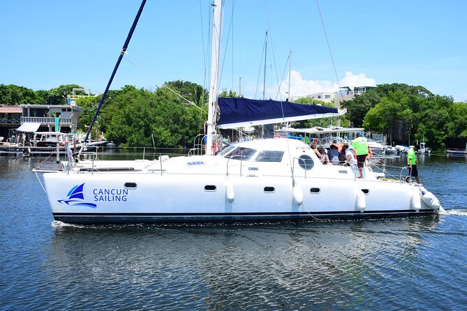 Catamaran Tour to Isla Mujeres, Open bar, Lunch, Snorkeling, Beach Club Included - Buffet lunch and beach club time