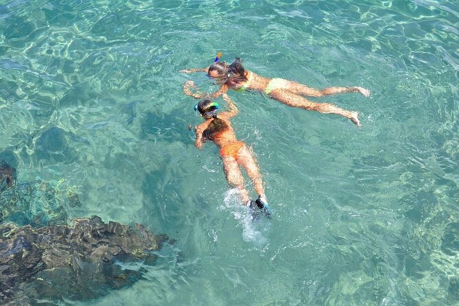 Catamaran Unlimited Adventure to Isla Mujeres" From Cancun - Seeing Isla Mujeres from the catamaran